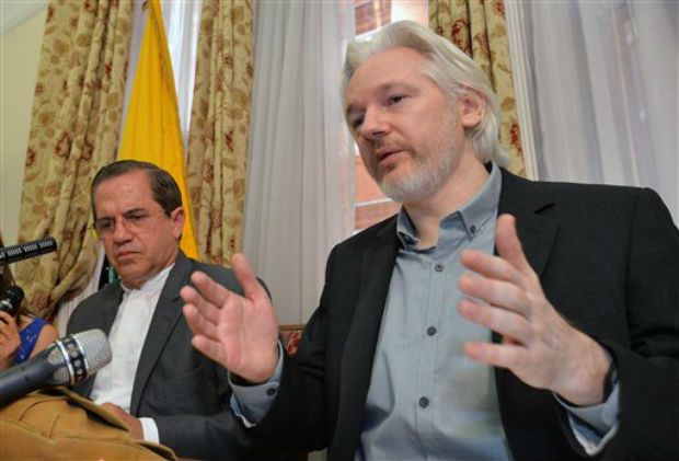 Ecuador's Foreign Minister Ricardo Patino, left, and WikiLeaks founder Julian Assange speak during a press conference inside the Ecuadorian Embassy in London. (Photo: AP/file) Ecuador's Foreign Minister Ricardo Patino, left, and WikiLeaks founder Julian Assange speak during a press conference inside the Ecuadorian Embassy in London. (Photo: AP/file)