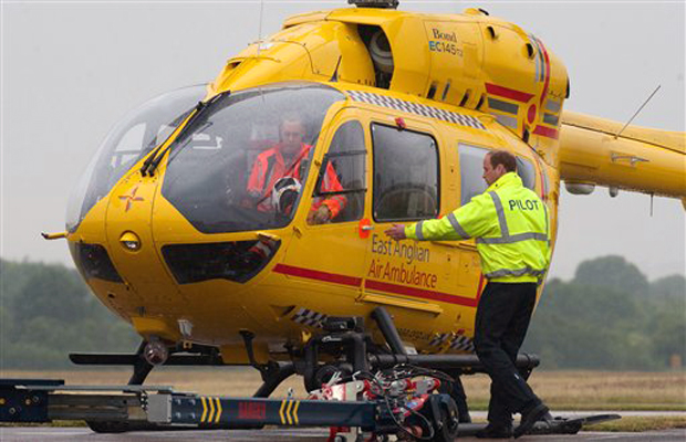 Britain's Prince William, the Duke of Cambridge prepares to board an East Anglian Air Ambulance (EAAA) at Cambridge Airport, Cambridge, in England, Monday July 13, 2015. Prince William says he's nervous but looking forward to getting started as he Britain's Prince William, the Duke of Cambridge prepares to board an East Anglian Air Ambulance (EAAA) at Cambridge Airport, Cambridge, in England, Monday July 13, 2015. Prince William says he's nervous but looking forward to getting started as he