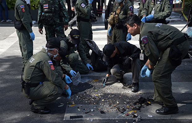 Police inspects the cordoned-off site of a bomb blast at the popular Erawan shrine in Bangkok. (Photo: AFP) Police inspects the cordoned-off site of a bomb blast at the popular Erawan shrine in Bangkok. (Photo: AFP)