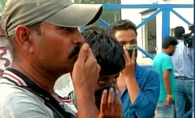 People shield themselves from the gas leak in Bhopal. (Photo: Twitter) People shield themselves from the gas leak in Bhopal. (Photo: Twitter)