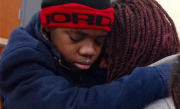 13-year-old boy who had been reported missing four years ago was discovered alive, hidden behind a fake wall of a home near Atlanta, Georgia, and reunited with his mother (Photo: Video grab) 13-year-old boy who had been reported missing four years ago was discovered alive, hidden behind a fake wall of a home near Atlanta, Georgia, and reunited with his mother (Photo: Video grab)