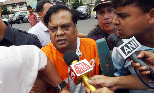 Chotta Rajan is escorted by plain-clothed police officers for questioning in Bali, Indonesia (Photo: AP) Chotta Rajan is escorted by plain-clothed police officers for questioning in Bali, Indonesia (Photo: AP)