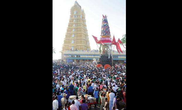 Devotees at Chamundeshwari rathotsava atop the Chamundi Hills in Mysuru on Sunday. (Photo: DC) Devotees at Chamundeshwari rathotsava atop the Chamundi Hills in Mysuru on Sunday. (Photo: DC)