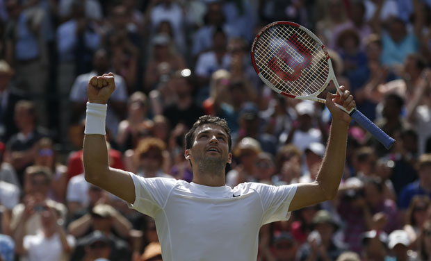 Bulgaria's Grigor Dimitrov reacts after defeating Andy Murray. Photo: AP Bulgaria's Grigor Dimitrov reacts after defeating Andy Murray. Photo: AP