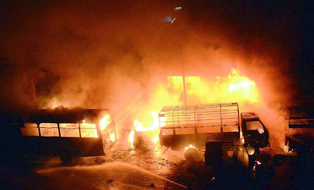 Flames rage at the scene of a blaze near the Ambedkar Statue Centre near Anam Kalakshetram in Rajahmundry on Wednesday. (Photo: DC) Flames rage at the scene of a blaze near the Ambedkar Statue Centre near Anam Kalakshetram in Rajahmundry on Wednesday. (Photo: DC)