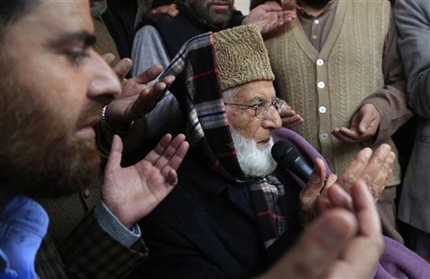 Separatist leader Syed Ali Shah Geelani, center, speaks during a campaign against the ongoing general elections on the outskirts of Srinagar, India. (Photo: AP) Separatist leader Syed Ali Shah Geelani, center, speaks during a campaign against the ongoing general elections on the outskirts of Srinagar, India. (Photo: AP)