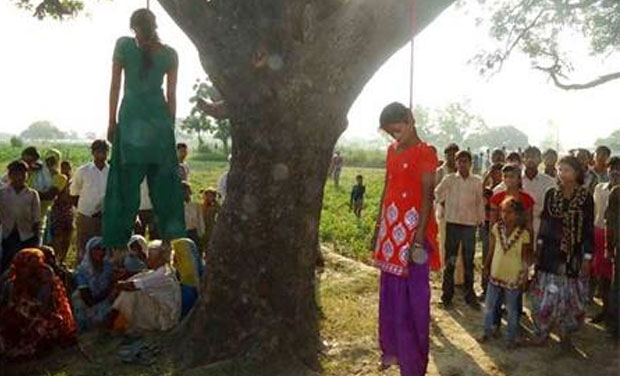 Bodies of the two girls who were gangraped in a village in Uttar Pradesh. (Photo: Dainik Bhaskar) Bodies of the two girls who were gangraped in a village in Uttar Pradesh. (Photo: Dainik Bhaskar)