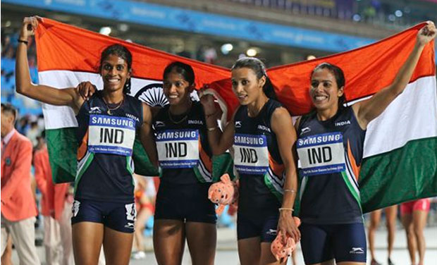 Indian team members celebrate with the national fag after finishing first in the women's 4 x 400m relay final at the 17th Asian Games in Incheon, South Korea, Thursday, Oct. 2, 2014.(Photo: AP)
Indian team members celebrate with the national fag after finishing first in the women's 4 x 400m relay final at the 17th Asian Games in Incheon, South Korea, Thursday, Oct. 2, 2014.(Photo: AP)