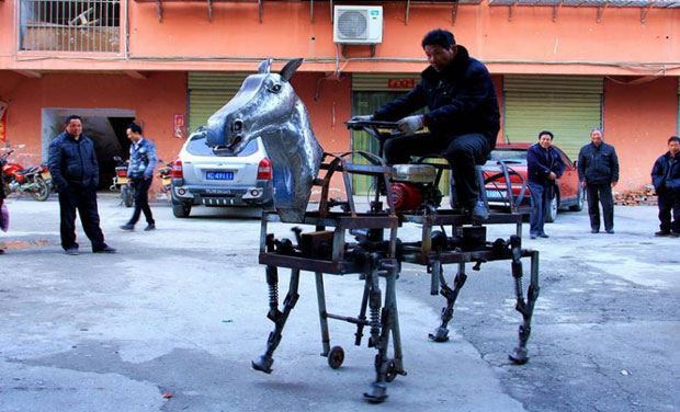 The horse weighs 250kg and has four legs and two supportive wheels to keep it moving. Picture Courtesy: Quirky China News The horse weighs 250kg and has four legs and two supportive wheels to keep it moving. Picture Courtesy: Quirky China News
