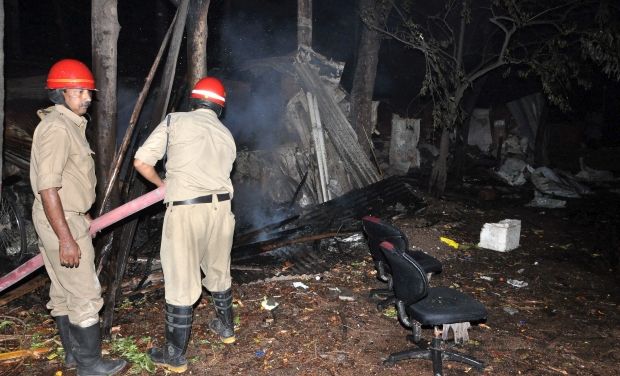 Firefighters putting off fire from a explosion site at a gas filing station at Kachiguda in Hyderabad (Photo: PTI) Firefighters putting off fire from a explosion site at a gas filing station at Kachiguda in Hyderabad (Photo: PTI)