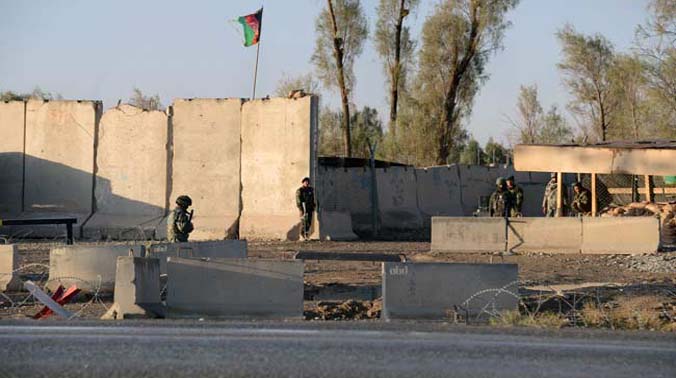 Afghan security personel stand guard near the airport complex in Kandahar (Photo: AFP) Afghan security personel stand guard near the airport complex in Kandahar (Photo: AFP)