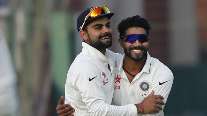 Indian spinner Ravindra Jadeja, right, is hugged by team captain Virat Kohli after he took the wicket of South African batsman Dane Piedt, on the second day of the fourth test match between the two countries, in New Delhi. (Photo: AP) Indian spinner Ravindra Jadeja, right, is hugged by team captain Virat Kohli after he took the wicket of South African batsman Dane Piedt, on the second day of the fourth test match between the two countries, in New Delhi. (Photo: AP)