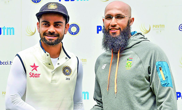Virat Kohli and Hashim Amla greet each other after day five of the second Test was abandoned without a ball being bowled. (Photo: R. SAMUEL) Virat Kohli and Hashim Amla greet each other after day five of the second Test was abandoned without a ball being bowled. (Photo: R. SAMUEL)