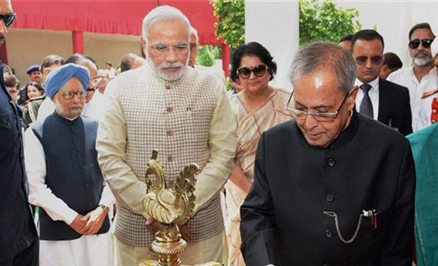 President Pranab Mukherjee with Prime Minister Narendra Modi lighting the lamp at the inauguration of the newly created museum at Rashtrapati Bhavan in New Delhi on Friday. (Photo: AP)
President Pranab Mukherjee with Prime Minister Narendra Modi lighting the lamp at the inauguration of the newly created museum at Rashtrapati Bhavan in New Delhi on Friday. (Photo: AP) 