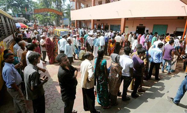 eople wait in queues to cast votes for Assembly polls, at a polling station in Mumbai on Wednesday. (Photo: PTI) eople wait in queues to cast votes for Assembly polls, at a polling station in Mumbai on Wednesday. (Photo: PTI)