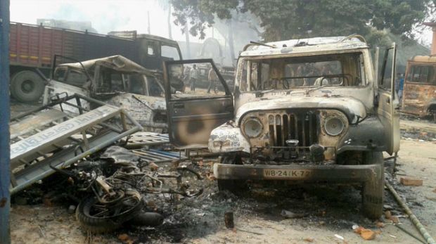 Vehicles set on fire after clashes between two groups at Kaliachak police station in Malda (Photo: PTI/File) Vehicles set on fire after clashes between two groups at Kaliachak police station in Malda (Photo: PTI/File)