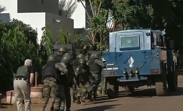 Security forces approach the Radisson Blu Hotel hotel in Bamako, Mali (Photo: AP) Security forces approach the Radisson Blu Hotel hotel in Bamako, Mali (Photo: AP)