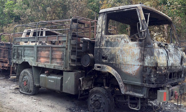 A charred army vehicle at the Thursday's ambush site in Chandel district of Manipur (Photo: PTI) A charred army vehicle at the Thursday's ambush site in Chandel district of Manipur (Photo: PTI)