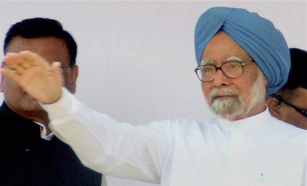 Prime Minister Manmohan Singh waves during an election rally at Puranpur in Pilibhit on Saturday. (Photo: PTI) Prime Minister Manmohan Singh waves during an election rally at Puranpur in Pilibhit on Saturday. (Photo: PTI)