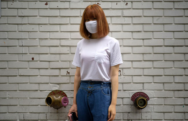 As the death toll from MERS mounts in South Korea, face masks are an increasingly common sight. Mask wearer Lee Hyun-Ah,19, poses for a photo on a street in the Hongdae area of Seoul. (Photo: AFP) As the death toll from MERS mounts in South Korea, face masks are an increasingly common sight. Mask wearer Lee Hyun-Ah,19, poses for a photo on a street in the Hongdae area of Seoul. (Photo: AFP)