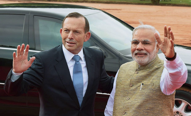 Prime Minister Narendra Modi with his Australian counterpart Tony Abbott during a ceremonial reception at Rashtrapati Bhavan in New Delhi on Friday. (Photo: PTI) Prime Minister Narendra Modi with his Australian counterpart Tony Abbott during a ceremonial reception at Rashtrapati Bhavan in New Delhi on Friday. (Photo: PTI)