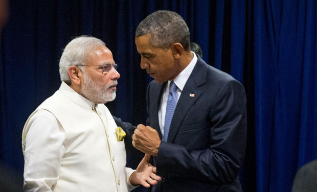 President Barack Obama and Prime Minister Narendra Modi speak to each other following a bilateral meeting. (Photo: AP) President Barack Obama and Prime Minister Narendra Modi speak to each other following a bilateral meeting. (Photo: AP)
