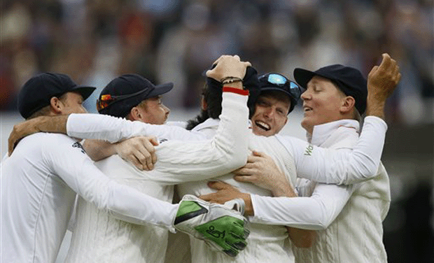 England's players hug Moeen Ali, centre, after he catches out New Zealand's Trent Boult to win the match, on the fifth day of the first Test match between England and New Zealand at Lord's cricket ground in London. (Photo: AP) England's players hug Moeen Ali, centre, after he catches out New Zealand's Trent Boult to win the match, on the fifth day of the first Test match between England and New Zealand at Lord's cricket ground in London. (Photo: AP)