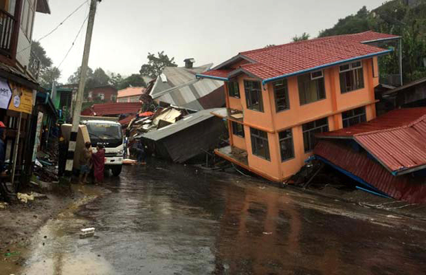 Apartments are destroyed following a landslide due to heavy rain in Harkhar, Chin State of Myanmar (Photo: AFP) Apartments are destroyed following a landslide due to heavy rain in Harkhar, Chin State of Myanmar (Photo: AFP)