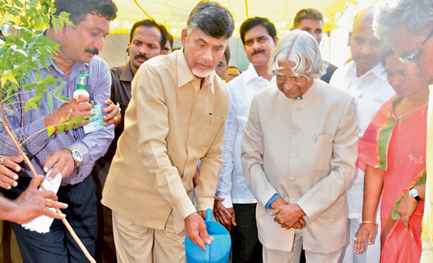 Chief Minister N. Chandrababu Naidu and former president A.P.J. Abdul Kalam water a plant during the inaugural function of the Mission on Primary Sector in Garudapuram in Anantapur on Monday. (Photo: DC ) Chief Minister N. Chandrababu Naidu and former president A.P.J. Abdul Kalam water a plant during the inaugural function of the Mission on Primary Sector in Garudapuram in Anantapur on Monday. (Photo: DC )