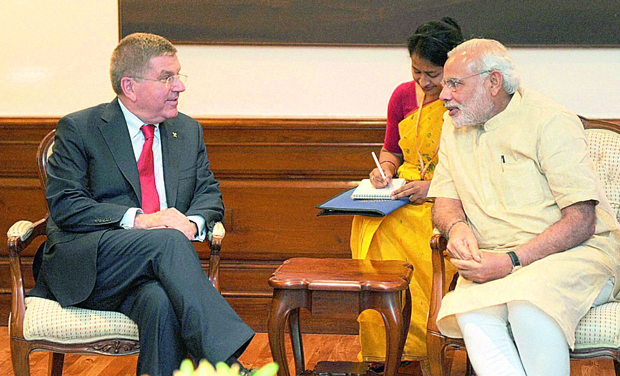 Prime Minister Narendra Modi with International Olympic Committee president Thomas Bach in New Delhi on Monday. (Photo: PTI) Prime Minister Narendra Modi with International Olympic Committee president Thomas Bach in New Delhi on Monday. (Photo: PTI)