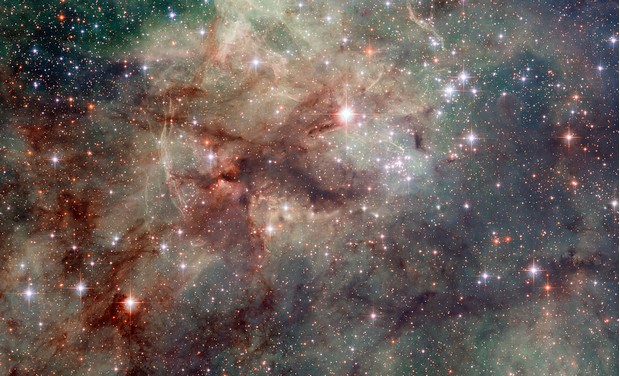 This Hubble image shows part of the Tarantula, the brightest star-forming region in the local Universe. This nebula is found in the Large Magellanic Cloud, a companion galaxy of the Milky Way (Photo Credits: NASA) This Hubble image shows part of the Tarantula, the brightest star-forming region in the local Universe. This nebula is found in the Large Magellanic Cloud, a companion galaxy of the Milky Way (Photo Credits: NASA)