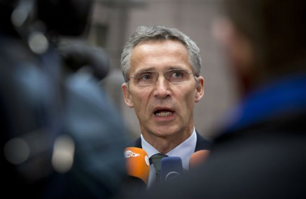 NATO Secretary General Jens Stoltenberg speaks with the media as he arrives for a meeting with EU defense ministers at the EU Council building in Brussels on Tuesday. (Photo: AP) NATO Secretary General Jens Stoltenberg speaks with the media as he arrives for a meeting with EU defense ministers at the EU Council building in Brussels on Tuesday. (Photo: AP)