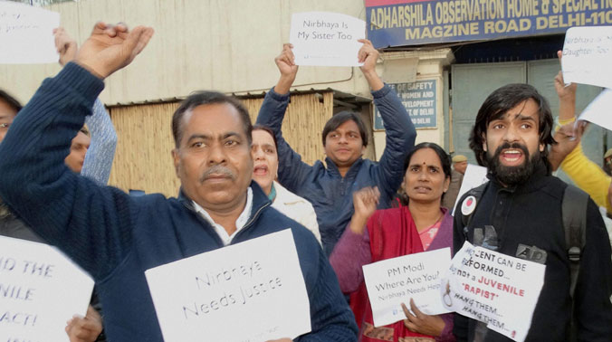 Activists along with Nirbhaya's parents staging a protest against the release of juvenile delinquent in the 2012 Delhi gangrape case. (Photo: PTI) Activists along with Nirbhaya's parents staging a protest against the release of juvenile delinquent in the 2012 Delhi gangrape case. (Photo: PTI)