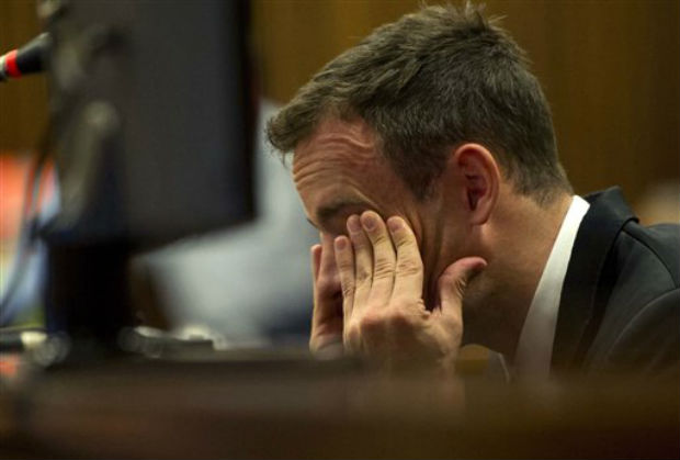 Oscar Pistorius reacts as he listens to evidence by a pathologist in court in Pretoria, South Africa, on Monday. (Photo: AP)
Oscar Pistorius reacts as he listens to evidence by a pathologist in court in Pretoria, South Africa, on Monday. (Photo: AP) 