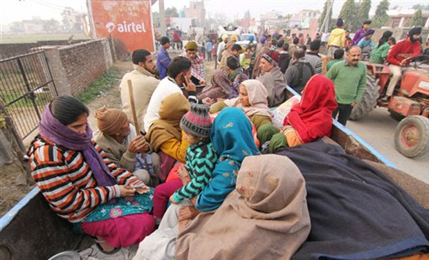 Villagers move to safer places with their belongings by a tractor after shelling from the Pakistani side. (Photo: PTI) Villagers move to safer places with their belongings by a tractor after shelling from the Pakistani side. (Photo: PTI)