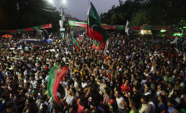 Supporters of Pakistan's cricketer-turned-politician Imran Khan gather to march to Islamabad from Lahore, Pakistan, Thursday, Aug. 14, 2014. (Photo: Associated Press) Supporters of Pakistan's cricketer-turned-politician Imran Khan gather to march to Islamabad from Lahore, Pakistan, Thursday, Aug. 14, 2014. (Photo: Associated Press)