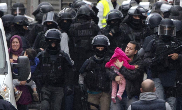 Residents are evacuated in Saint Denis, near Paris, Wednesday (Photo: AP) Residents are evacuated in Saint Denis, near Paris, Wednesday (Photo: AP)