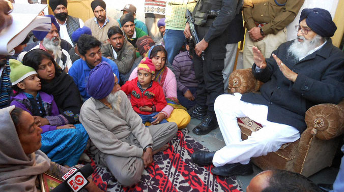 Punjab Chief Minister Parkash Singh Badal meeting the family members of Ikaadar Singh who was killed by the terrorists before thay attacked IAF base, as village Bhagwaal in Pathankot. (Photo: PTI) Punjab Chief Minister Parkash Singh Badal meeting the family members of Ikaadar Singh who was killed by the terrorists before thay attacked IAF base, as village Bhagwaal in Pathankot. (Photo: PTI)
