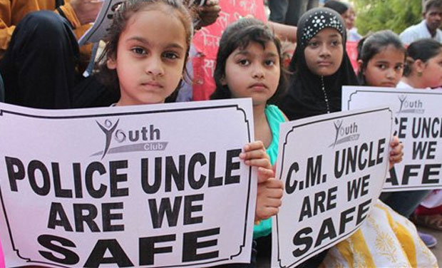 Children during a protest against the rape of girls in Badaun and other places in Uttar Pradesh at GPO in Lucknow. (Photo: AP) Children during a protest against the rape of girls in Badaun and other places in Uttar Pradesh at GPO in Lucknow. (Photo: AP)