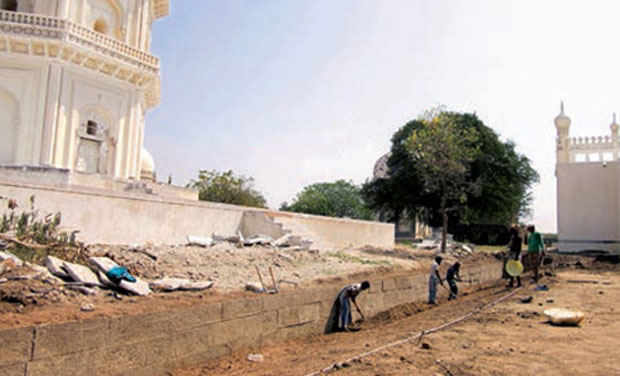 The 16th century enclosure wall that was discovered during conservation works at Qutub Shahi tombs on Tuesday. (Photo: DC) The 16th century enclosure wall that was discovered during conservation works at Qutub Shahi tombs on Tuesday. (Photo: DC)