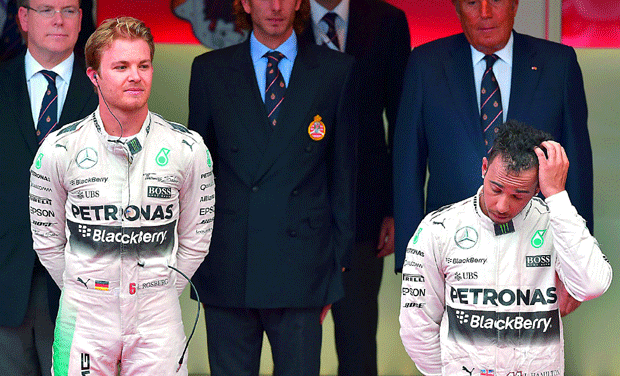 Mercedes driver Nico Rosberg (left) poses on the podium while teammate Lewis Hamilton looks crestfallen after the Monaco Grand Prix in Monte Carlo on Sunday. Rosberg won the race for the third straight year (Photo: AFP) Mercedes driver Nico Rosberg (left) poses on the podium while teammate Lewis Hamilton looks crestfallen after the Monaco Grand Prix in Monte Carlo on Sunday. Rosberg won the race for the third straight year (Photo: AFP)