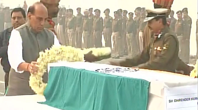 Home Minister Rajnath Singh pays homage to ten BSF personnel who were killed in a plane crash on Tuesday. (Photo: Twitter) Home Minister Rajnath Singh pays homage to ten BSF personnel who were killed in a plane crash on Tuesday. (Photo: Twitter)