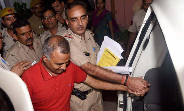 AAP MLA Somnath Bharti being taken into custody after he surrendered at the Dwarka North Police Station in New Delhi. (Photo: PTI) AAP MLA Somnath Bharti being taken into custody after he surrendered at the Dwarka North Police Station in New Delhi. (Photo: PTI)