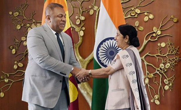 External Affairs Minister Sushma Swaraj shakes hands with Sri Lankan Foreign Minister Mangala Samaraweera in New Delhi on Sunday. (Photo: PTI) External Affairs Minister Sushma Swaraj shakes hands with Sri Lankan Foreign Minister Mangala Samaraweera in New Delhi on Sunday. (Photo: PTI)