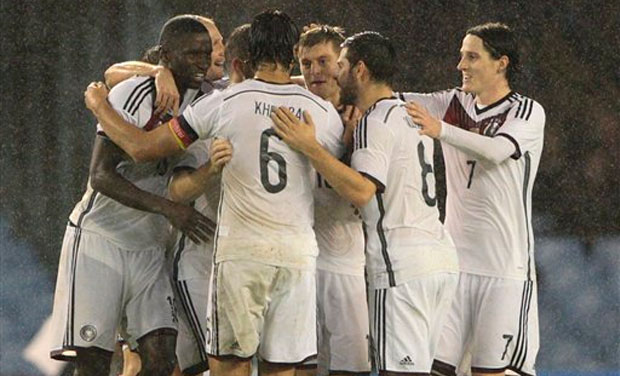 Germany's player celebrate after Toni Kroos scored against Spain during an international friendly soccer match between Spain and Germany at the Balaidos stadium, in Vigo, Spain Germany's player celebrate after Toni Kroos scored against Spain during an international friendly soccer match between Spain and Germany at the Balaidos stadium, in Vigo, Spain