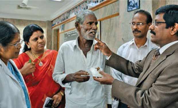 A 65-year-old man, who swallowed dentures during his sleep, interacting with the director and head of the Institute of Surgical Gastroenterology at the Rajiv Gandhi Government General Hospital on Friday, Dr S. M. Chandramohan and Dean Dr R. Vimala, A 65-year-old man, who swallowed dentures during his sleep, interacting with the director and head of the Institute of Surgical Gastroenterology at the Rajiv Gandhi Government General Hospital on Friday, Dr S. M. Chandramohan and Dean Dr R. Vimala,