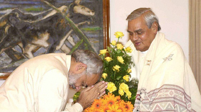 Narendra Modi seeks blessings of senior BJP leader and former PM Atal Bihari Vajpayee. (Photo: PTI) Narendra Modi seeks blessings of senior BJP leader and former PM Atal Bihari Vajpayee. (Photo: PTI)