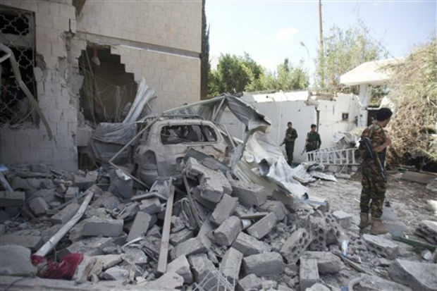 Police troopers stand guard at the damaged residence of the Iranian ambassador after a car bomb attack in Sanaa, Yemen, Wednesday, Dec. 3, 2014. (Photo: AP) Police troopers stand guard at the damaged residence of the Iranian ambassador after a car bomb attack in Sanaa, Yemen, Wednesday, Dec. 3, 2014. (Photo: AP)