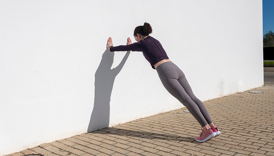 Elevate your strength with wall push-ups
