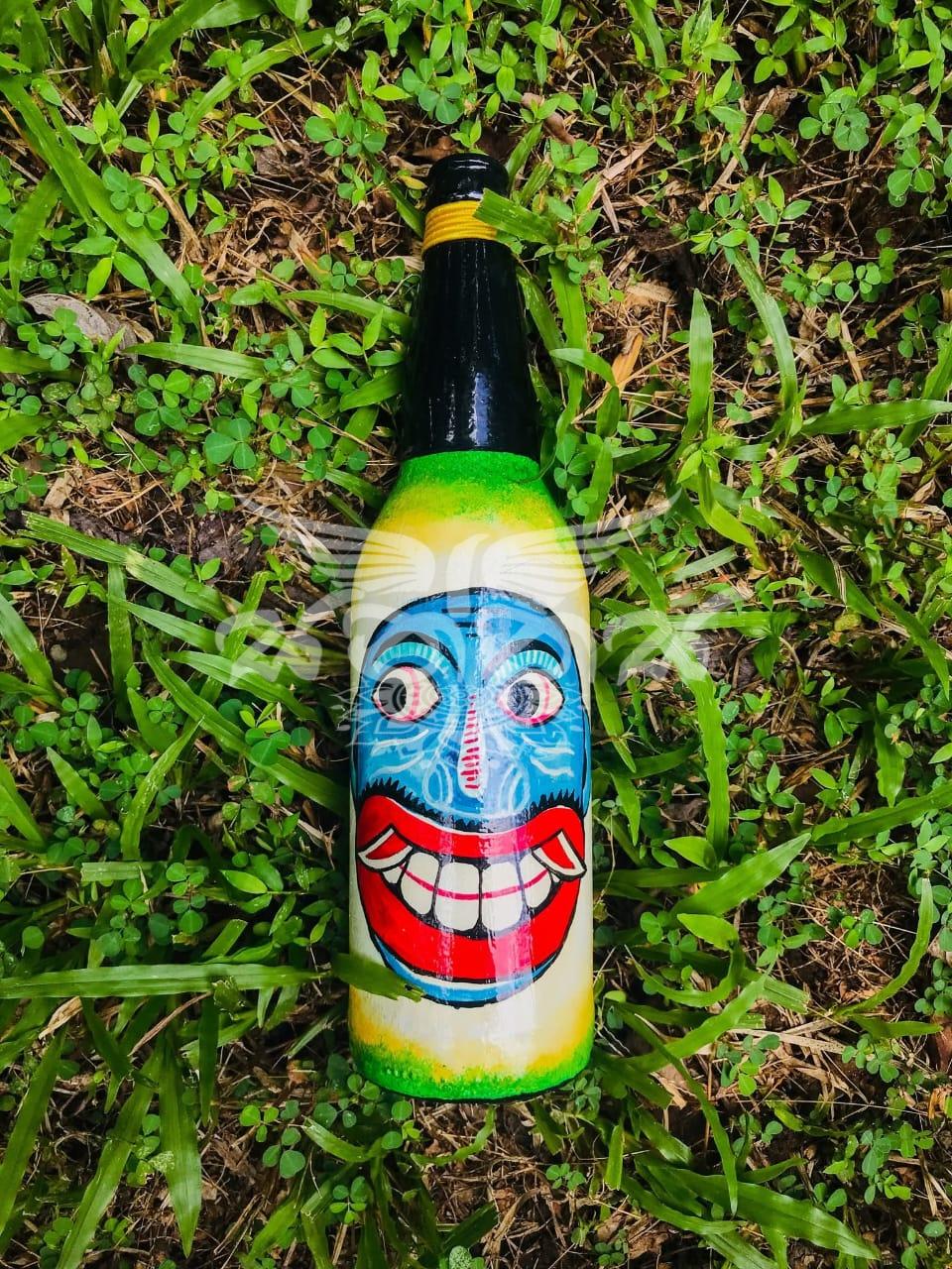 The Traditional Kolam Mask Faces on Bottle